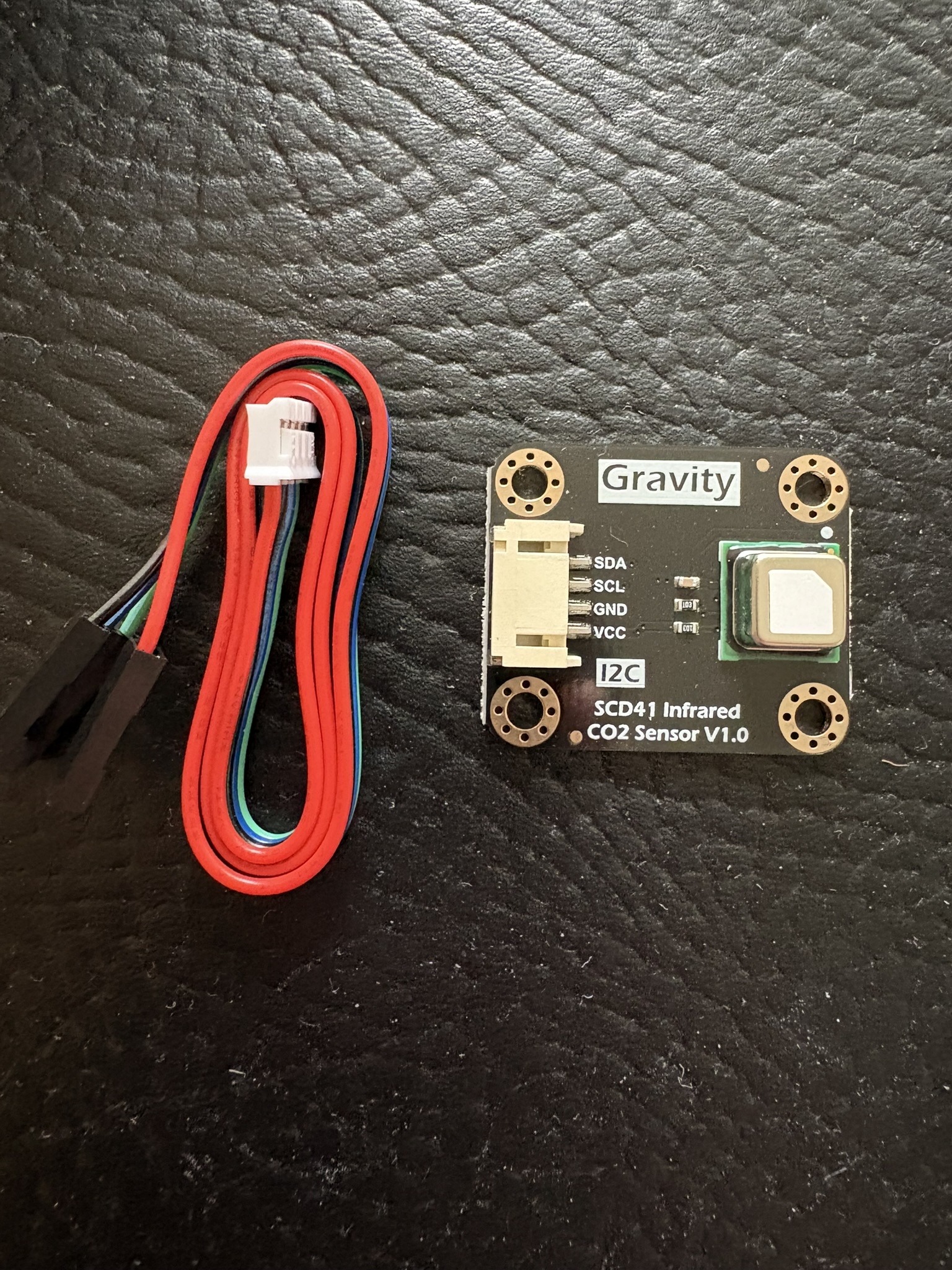Field proof of three STM32 room-health devices publishing live temperature and humidity through Rust IoT Gateway into Combotto Monitor, with fleet screenshots, board-level sensor context, and a planned SCD41 CO2 extension.